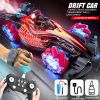 Remote control toy car F1 racing style, with music and light, the tail can be spray.